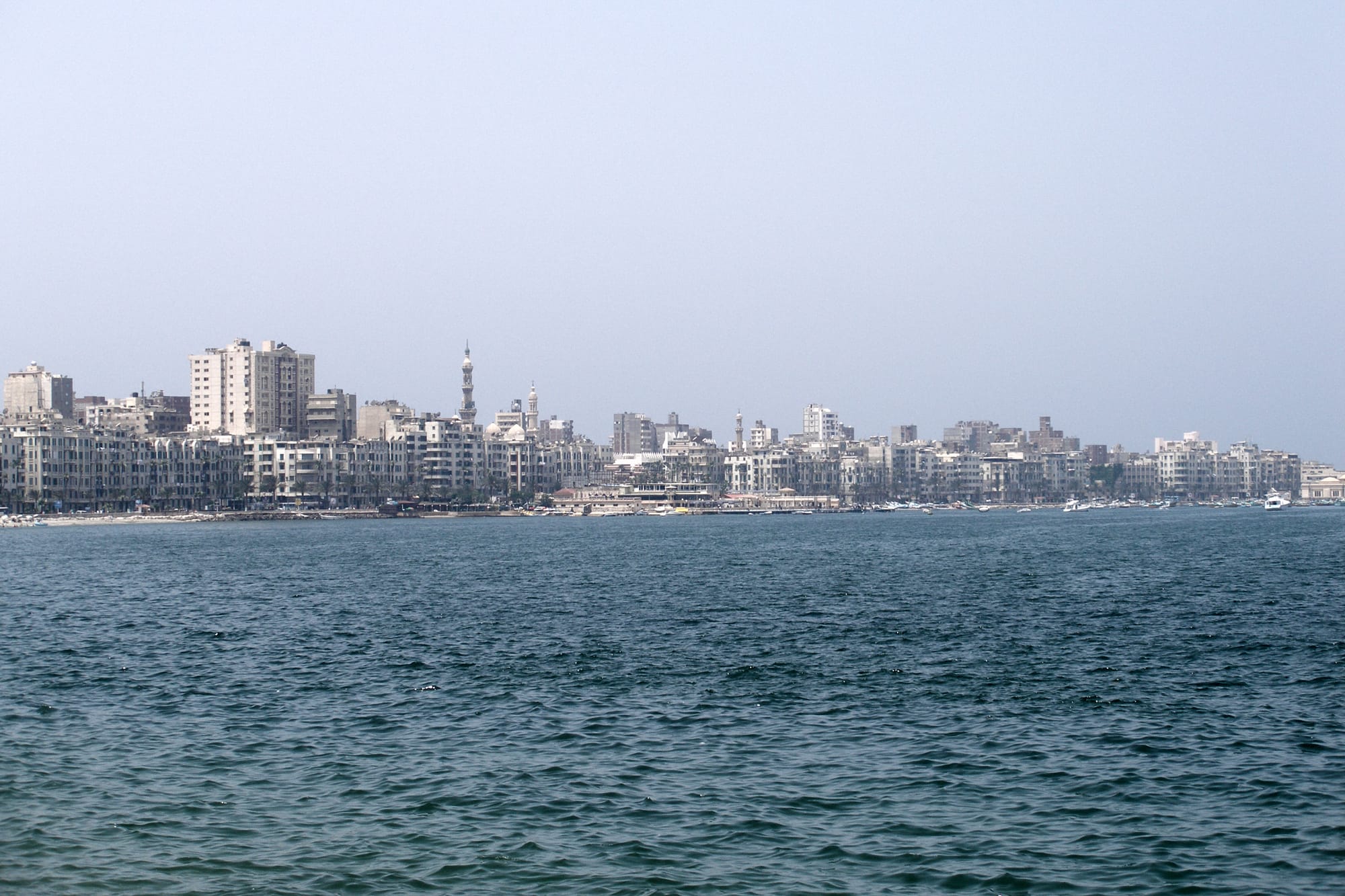 The waterfront of the Eastern Harbour of Alexandria, Egypt, seen across the water